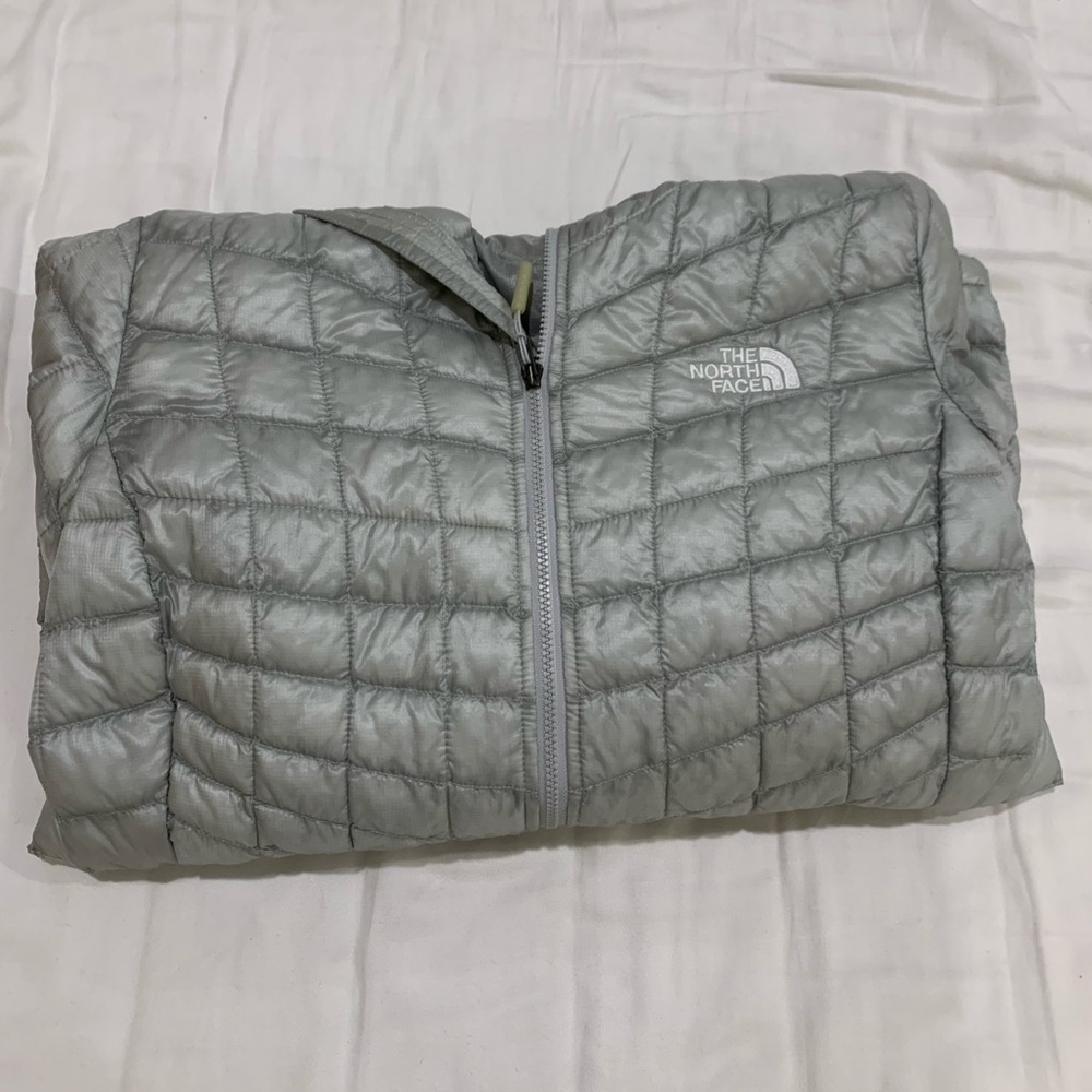 Gray North Face puffer jacket